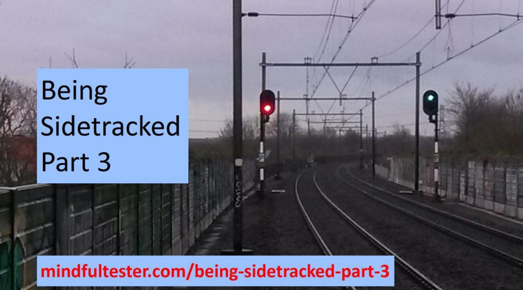 Railway with a red and green light in the early grey morning light. Showing texts “Being Sidetracked – Part 3” and “mindfultester.com/being-sidetracked-part-3”!