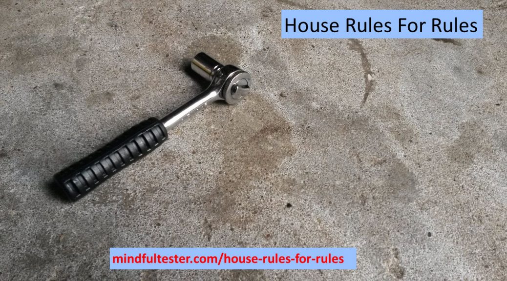 Ratchet wrench lying on a concrete floor. Showing texts “House Rules For Rules” and “mindfultester.com/house-rules-for-rules”!